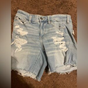 American Eagle midi length distressed shorts
